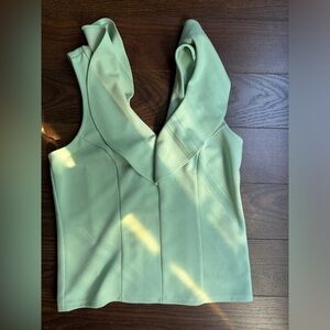 Green top with zipper